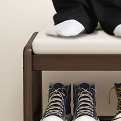 Scandinavische schoenenbank met houten frame en gevoerde zitting