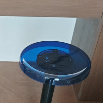 Verstelbare barkruk met ronde acrylzitting en stalen voet