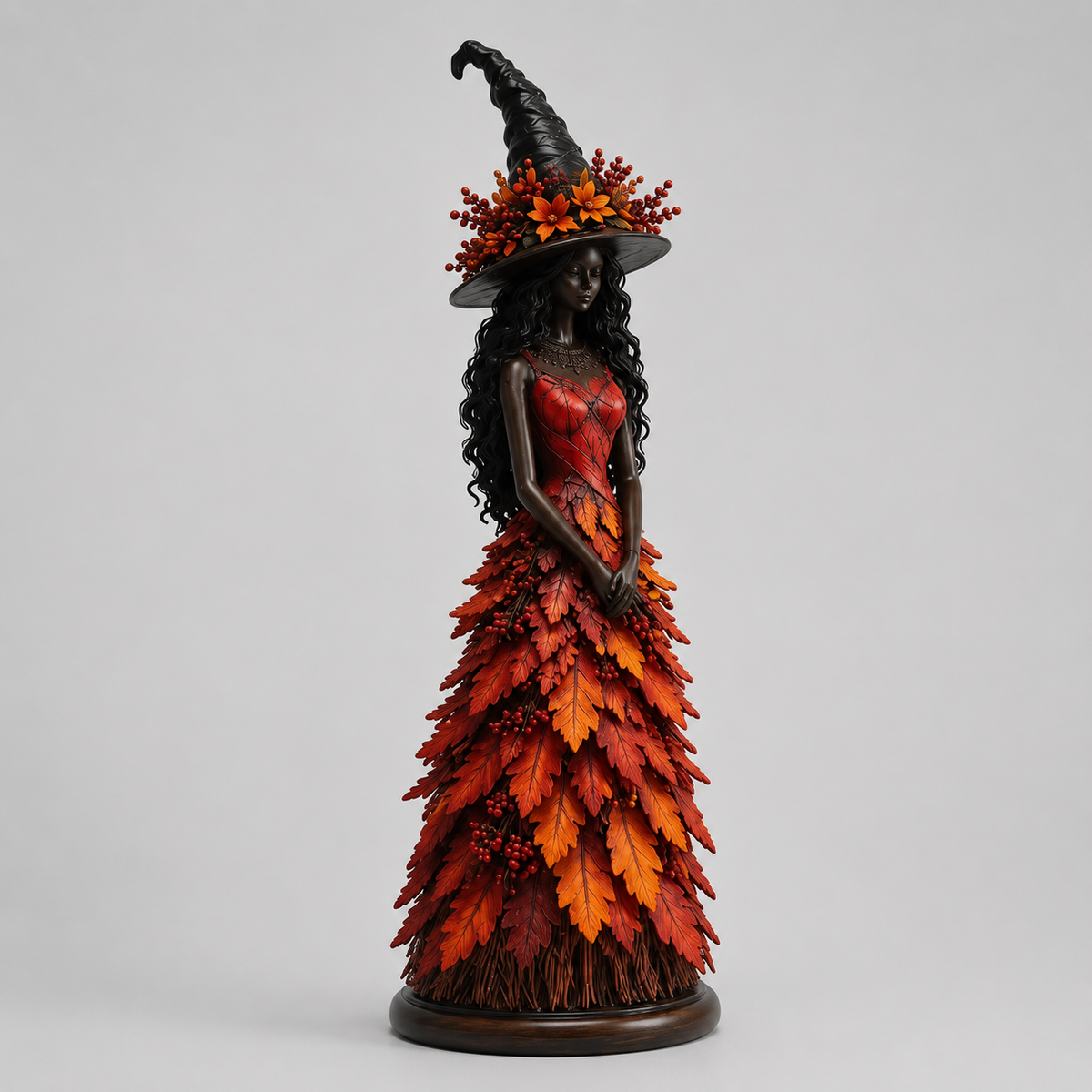 Halloweenbeeldje van een Heks met Gelaagd Herfstbladmotief