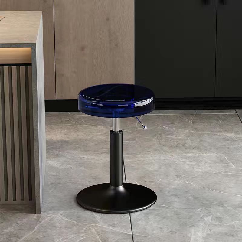 Verstelbare barkruk met ronde acrylzitting en stalen voet