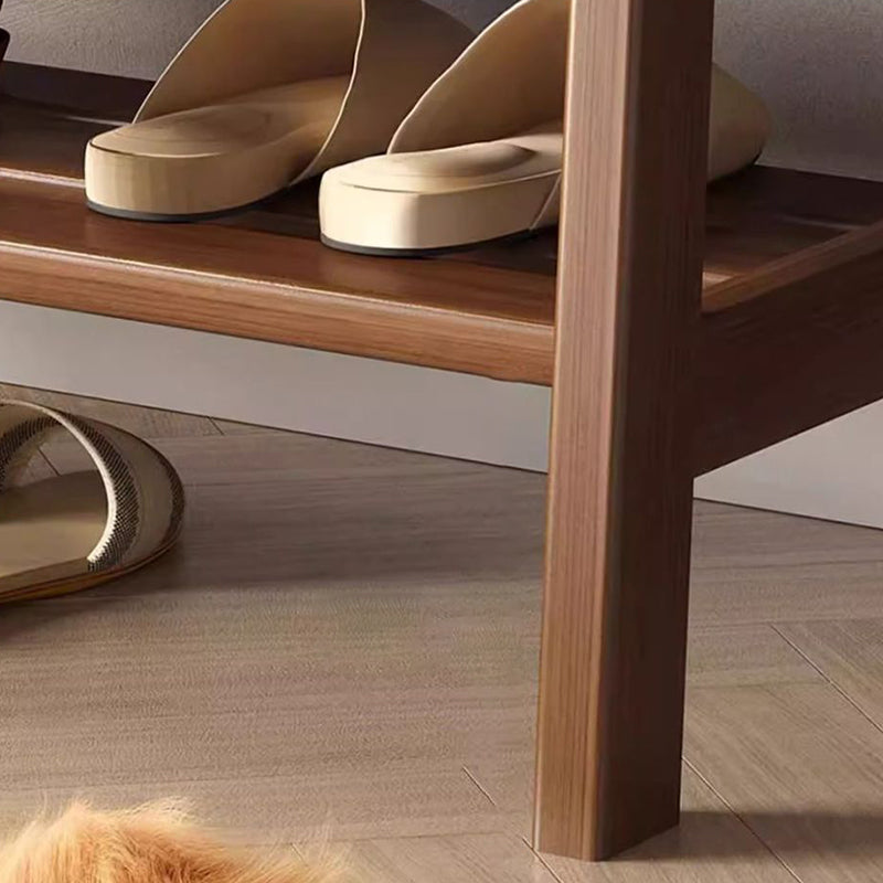 Scandinavische schoenenbank met houten frame en gevoerde zitting
