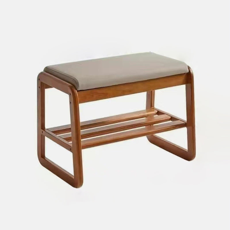 Scandinavische schoenenbank met houten frame en gevoerde zitting