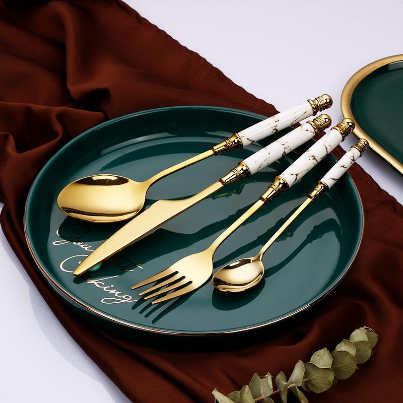 Goudkleurig Bestekset met Marmerlook Handgrepen