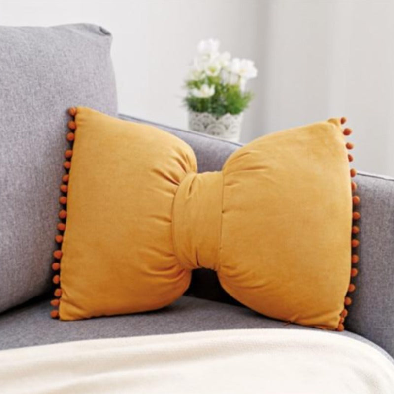 Decoratief Strikvormig Sierkussen met Pomponrand